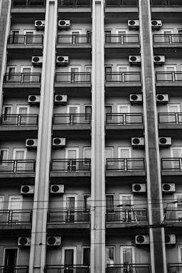 Rows of air conditioning units on a building facade