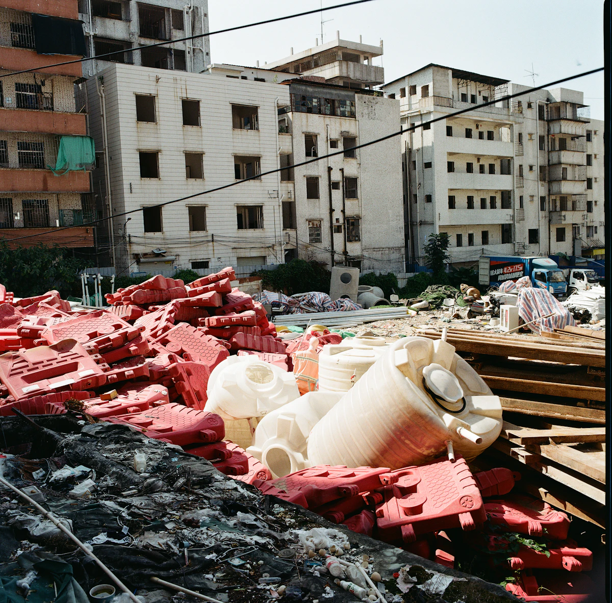 Photographer reviewing contact prints on a desk