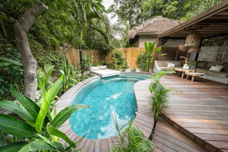 Tropical villa with a private pool and outdoor seating