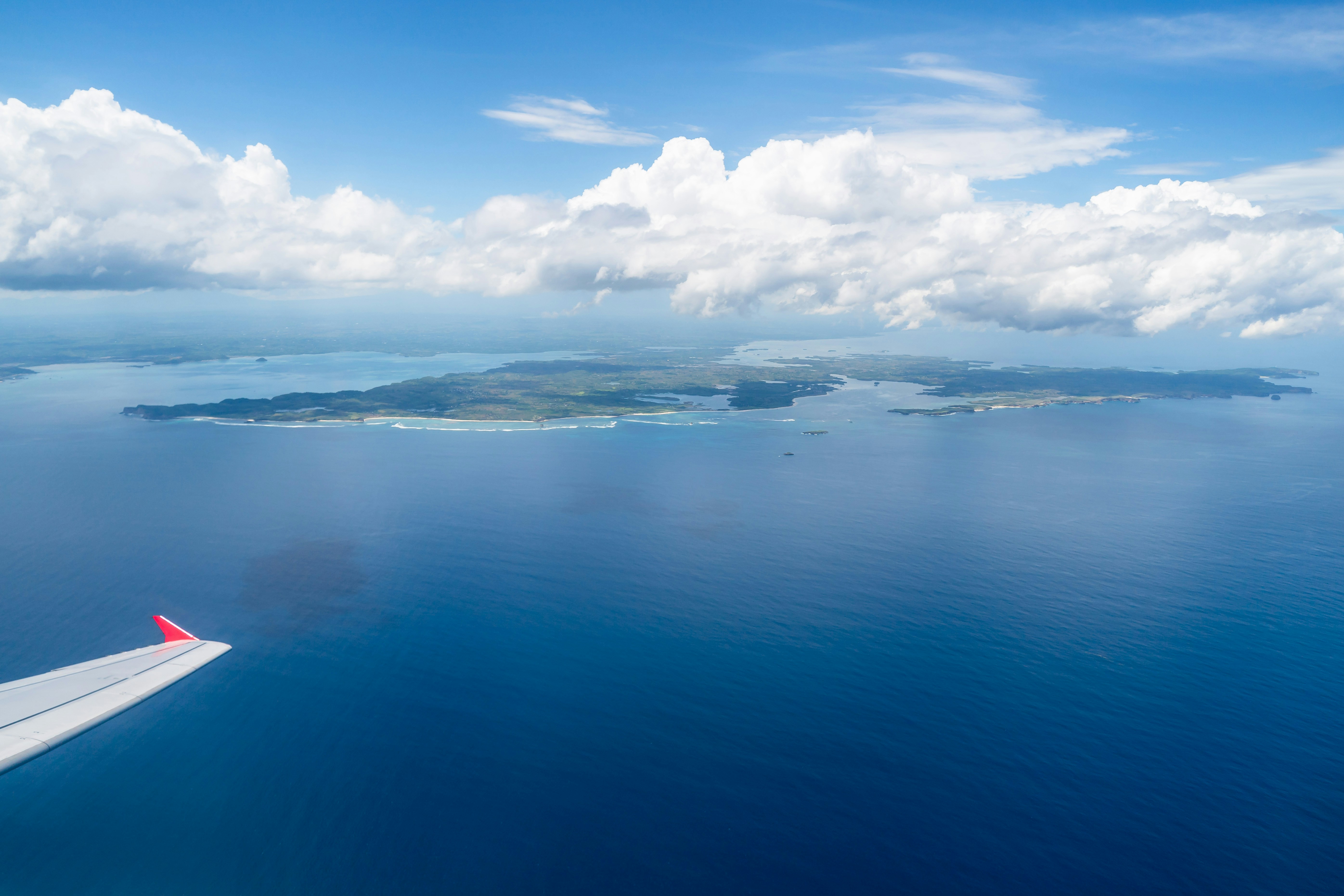 An aerial view of a Hawaiian island and the surrounding ocean