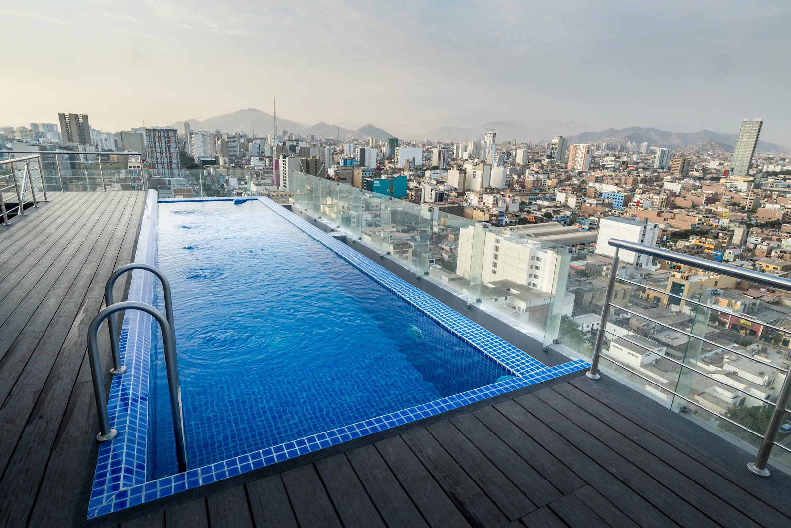 Rooftop infinity pool overlooking a city