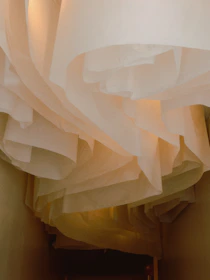 Layers of sheer fabric cascade downwards