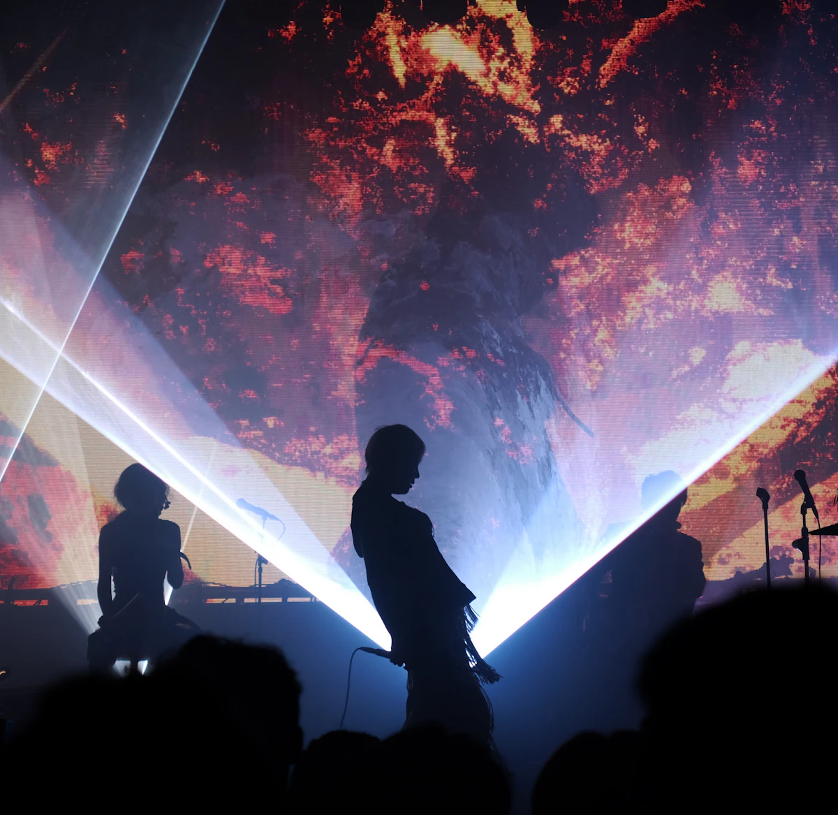 Professional live production with concert laser beams and controlled stage effects