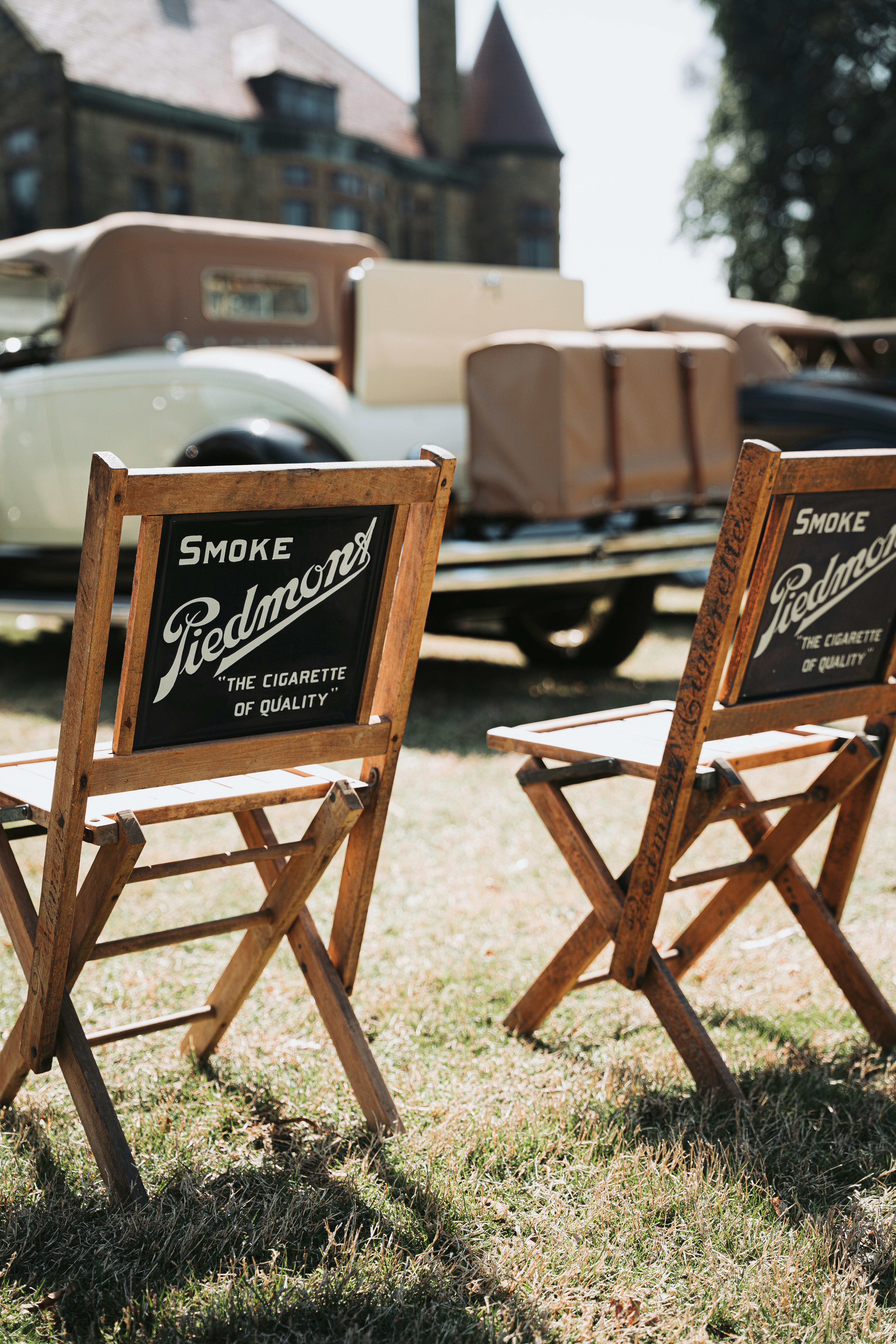 Two vintage chairs with piedmont cigarette advertisement