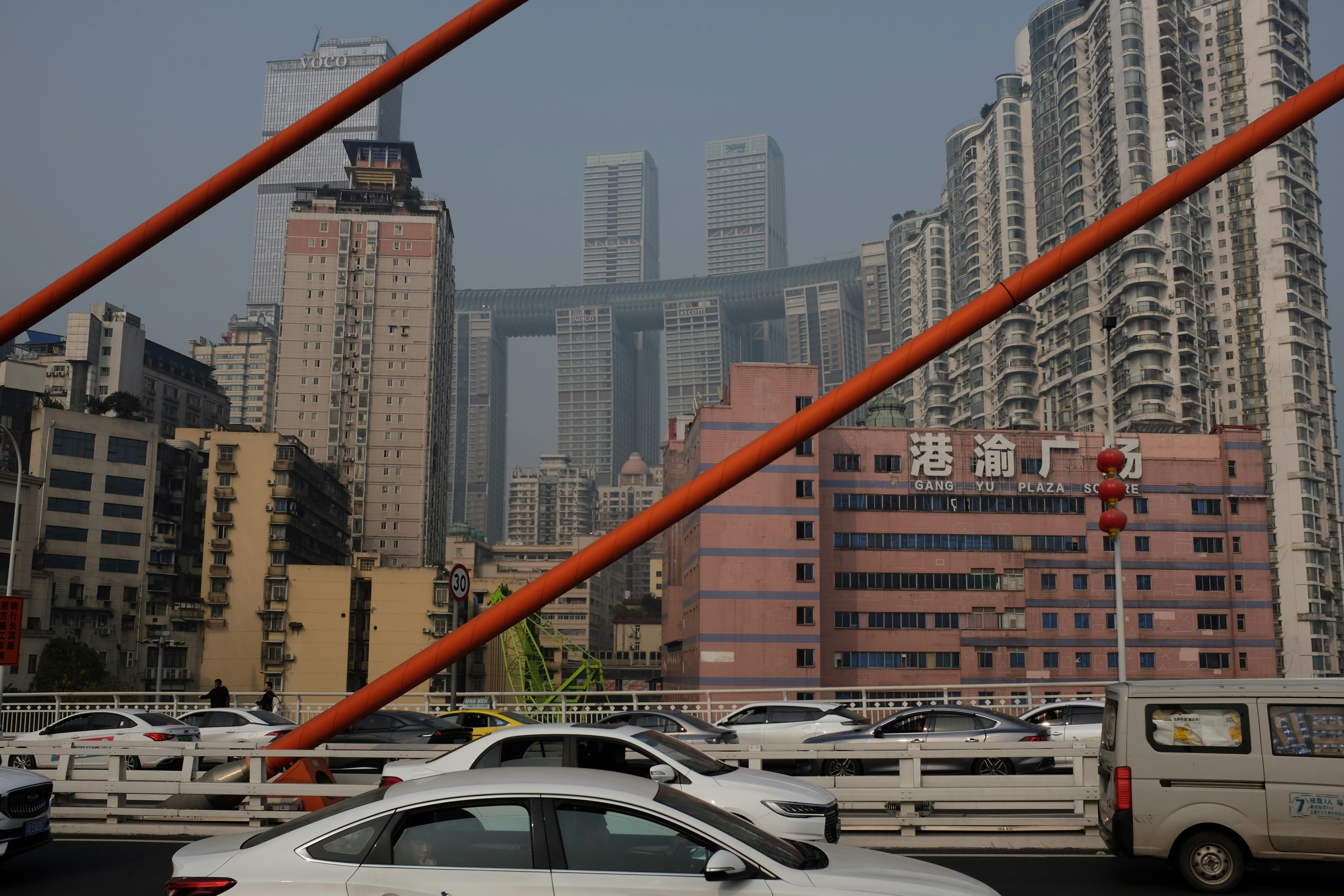 Cityscape with modern buildings and traffic on a bridge
