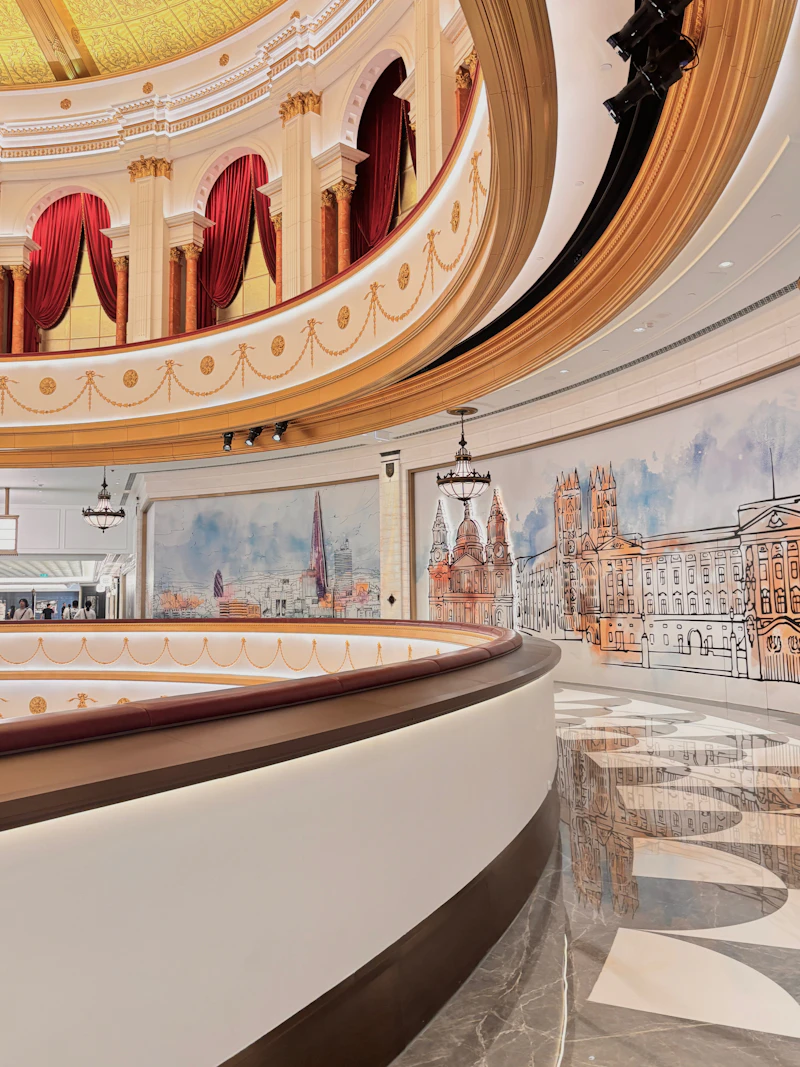 Elegant lobby interior with ornate murals