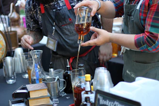 Bartenders preparing drinks at a bar