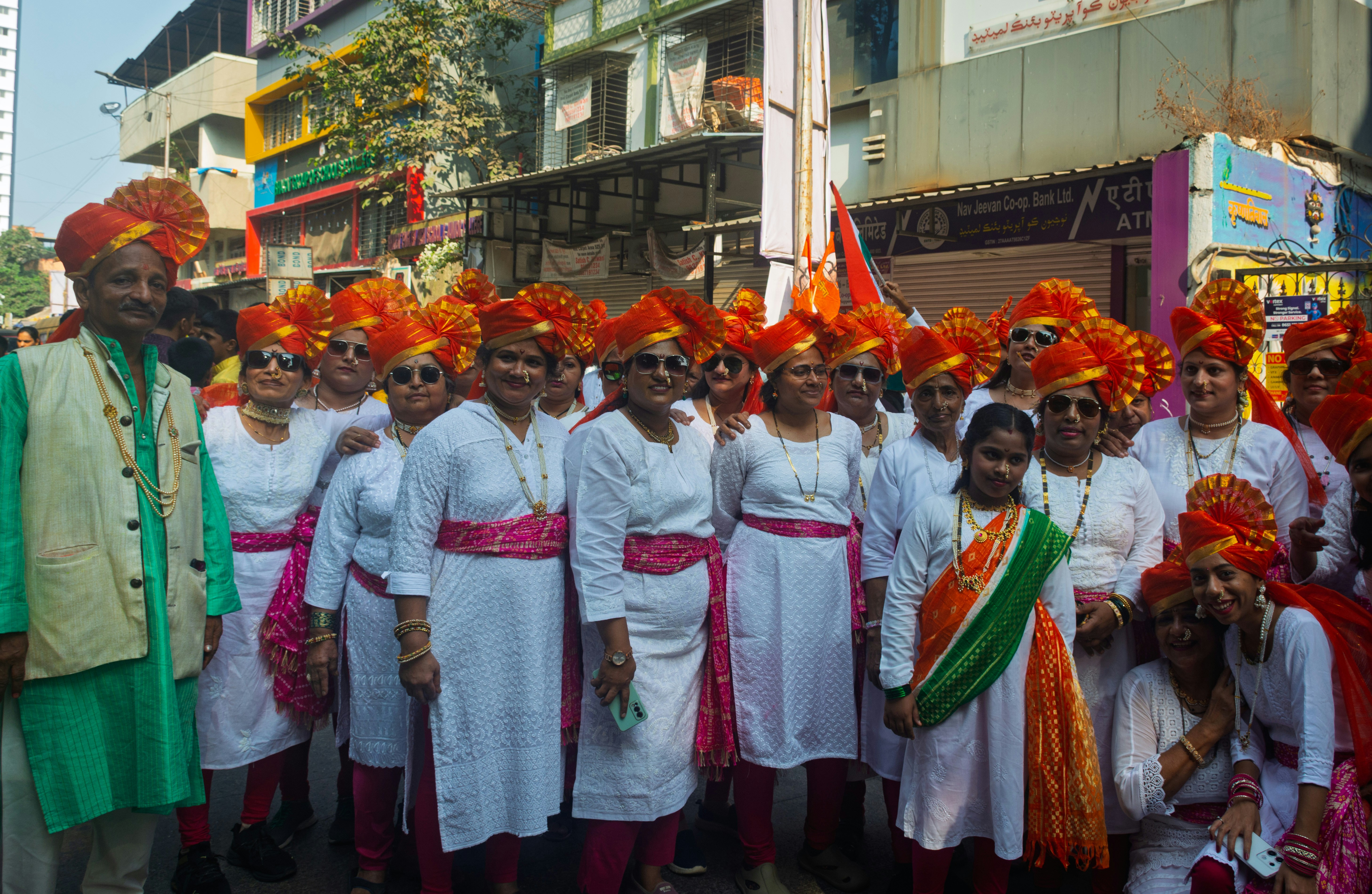 Group of people in traditional indian attire with turbans