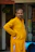 Man in a yellow kurta with hands in pockets