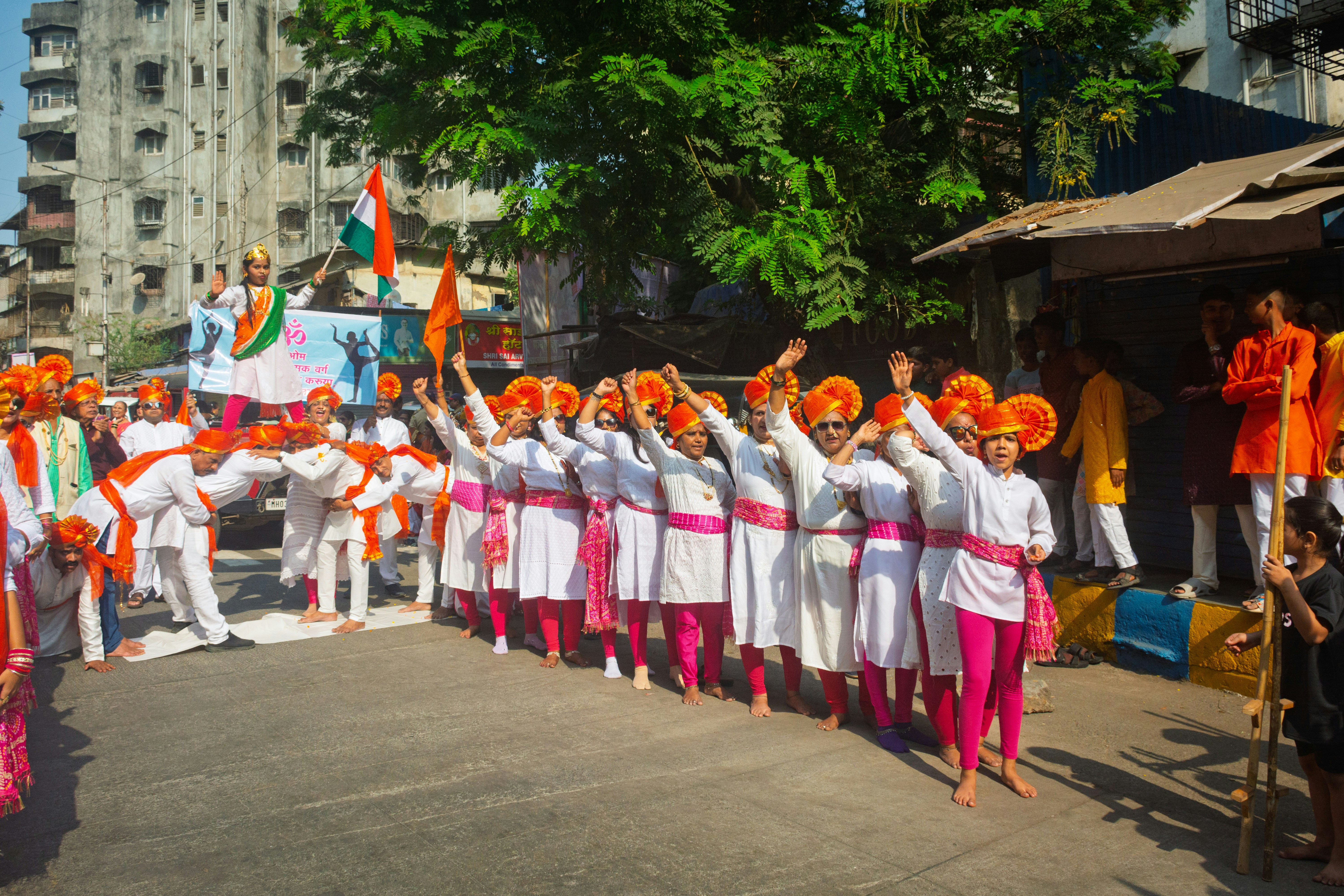 People in traditional indian attire celebrating outdoors