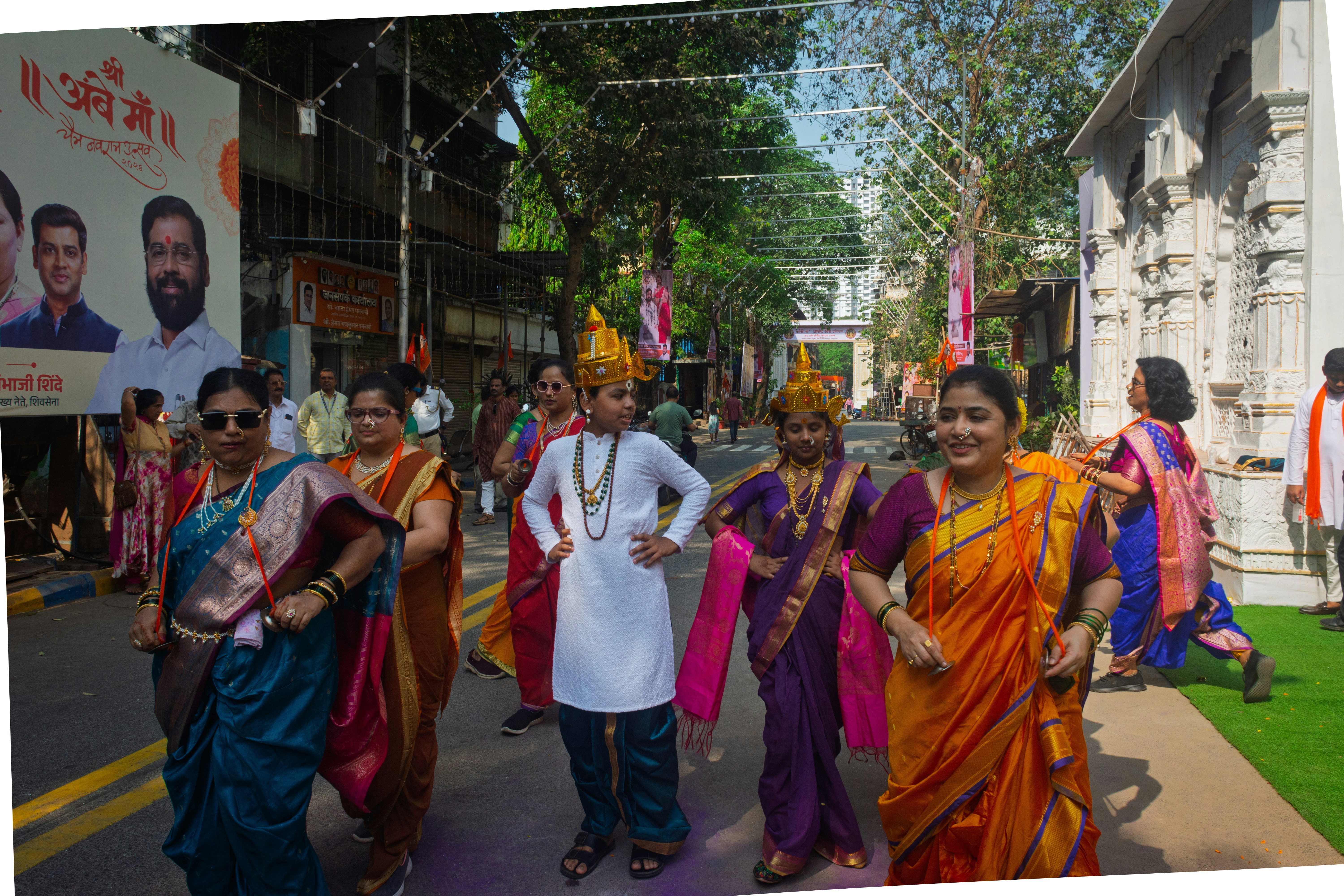 Puri Jagannath Temple's majestic entrance gate with a crowd of devotees, bathed in soft morning light.
