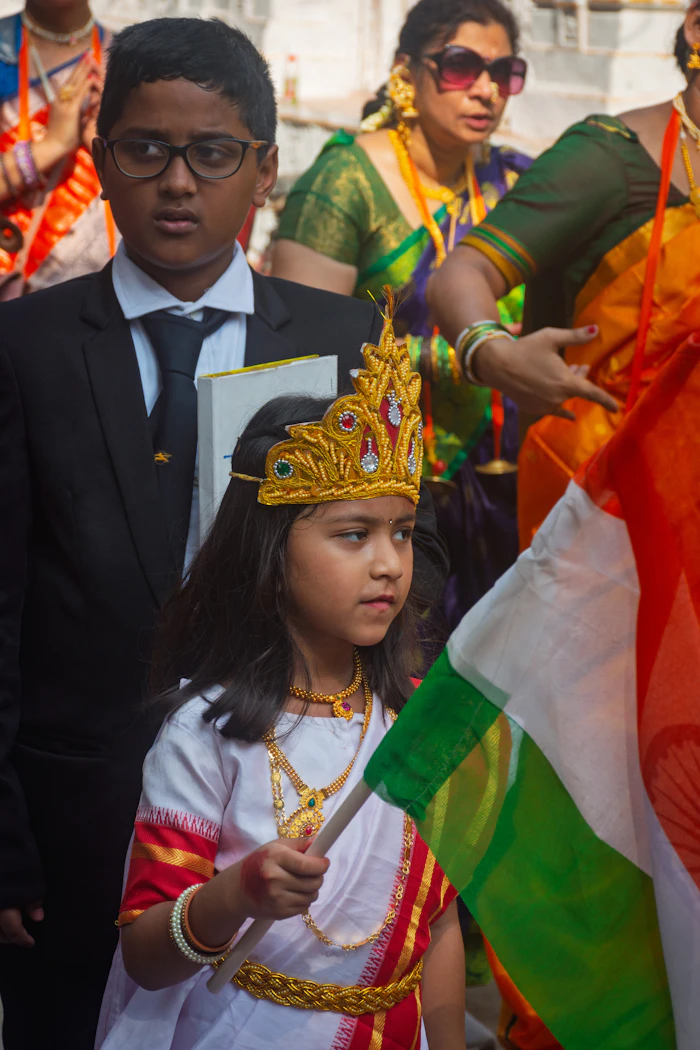 Indian children in colourful traditional festive outfits celebrating a festival