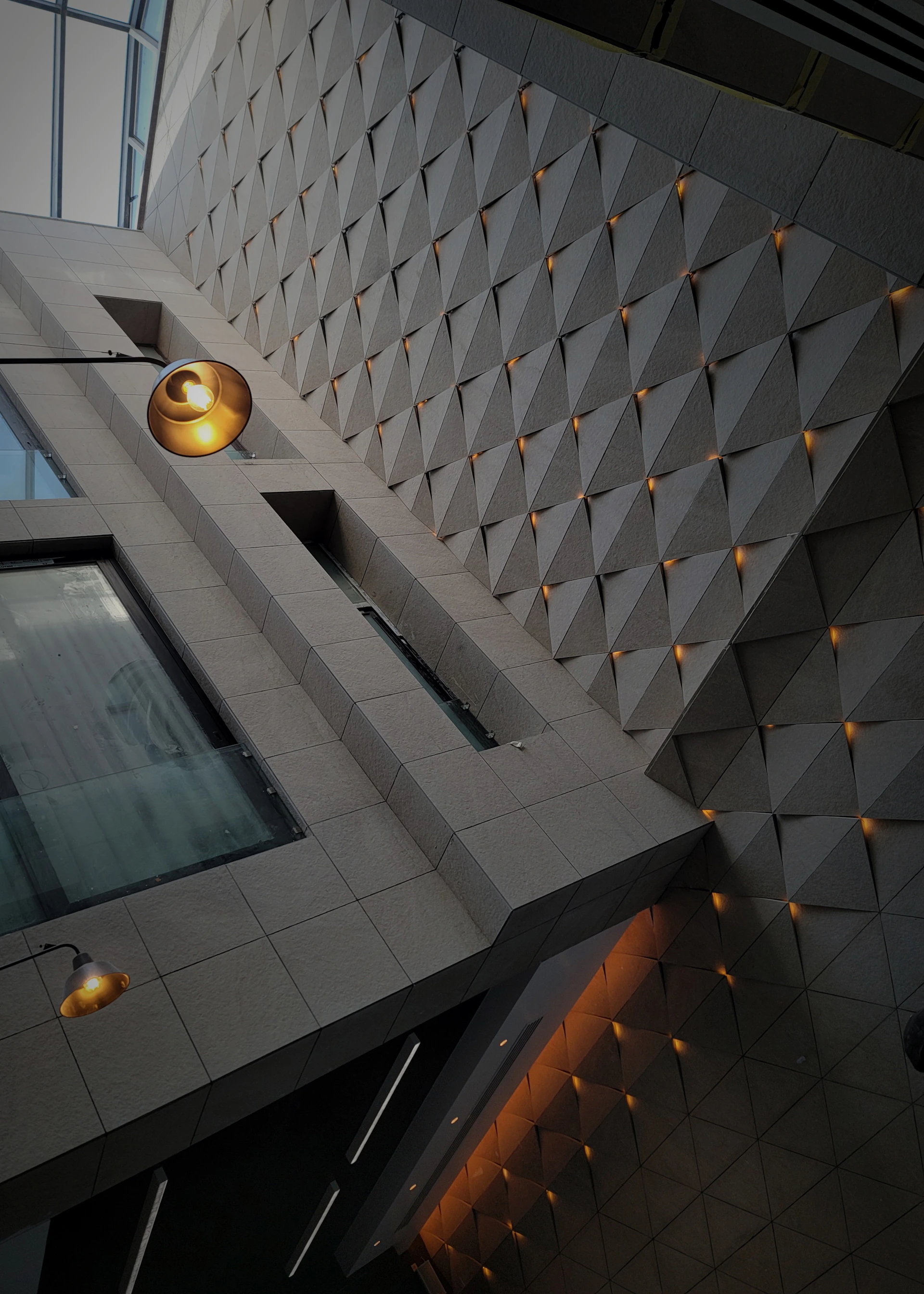 Modern architectural interior with geometric patterns and lighting