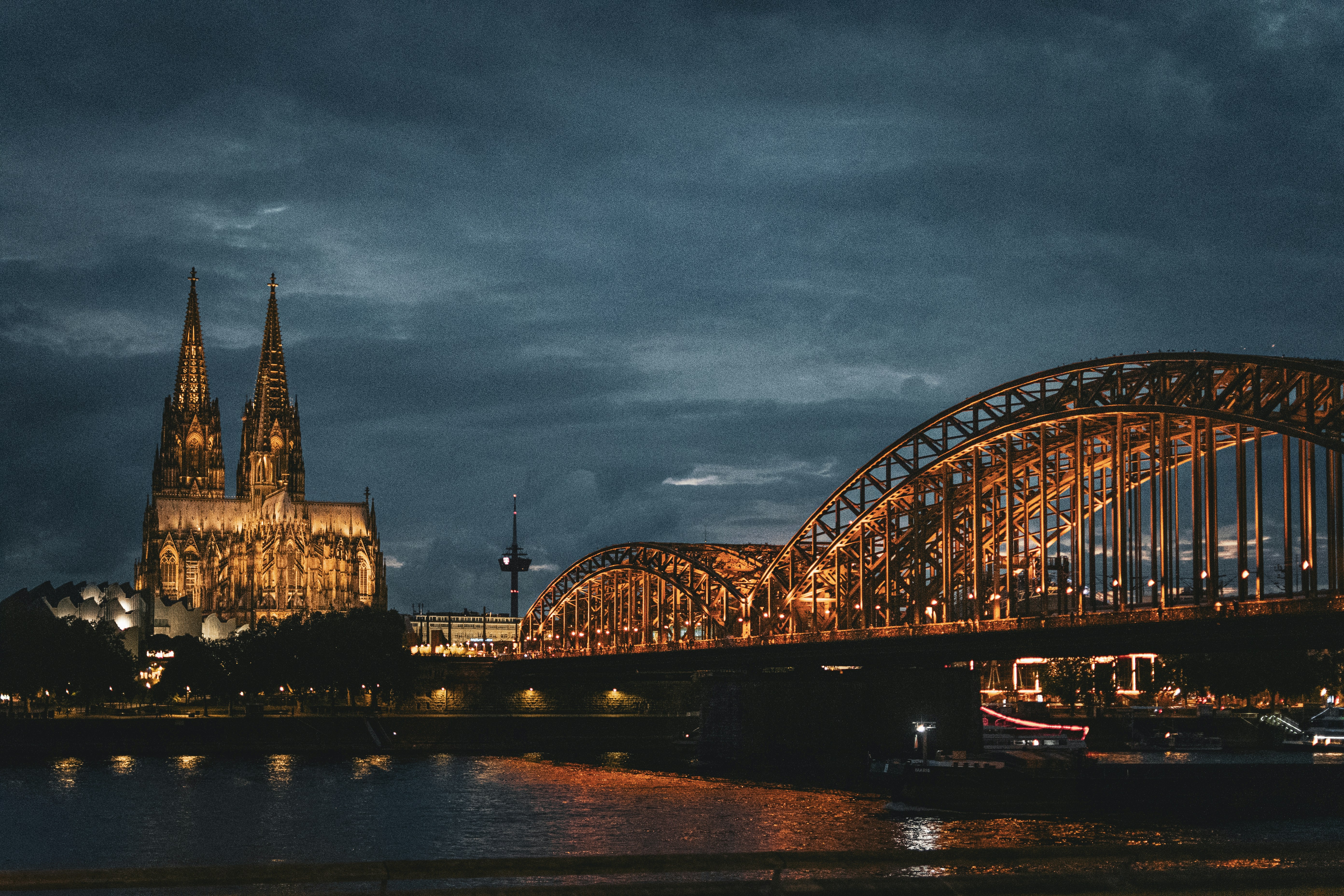 Cologne cathedral and hohenzollern bridge at night