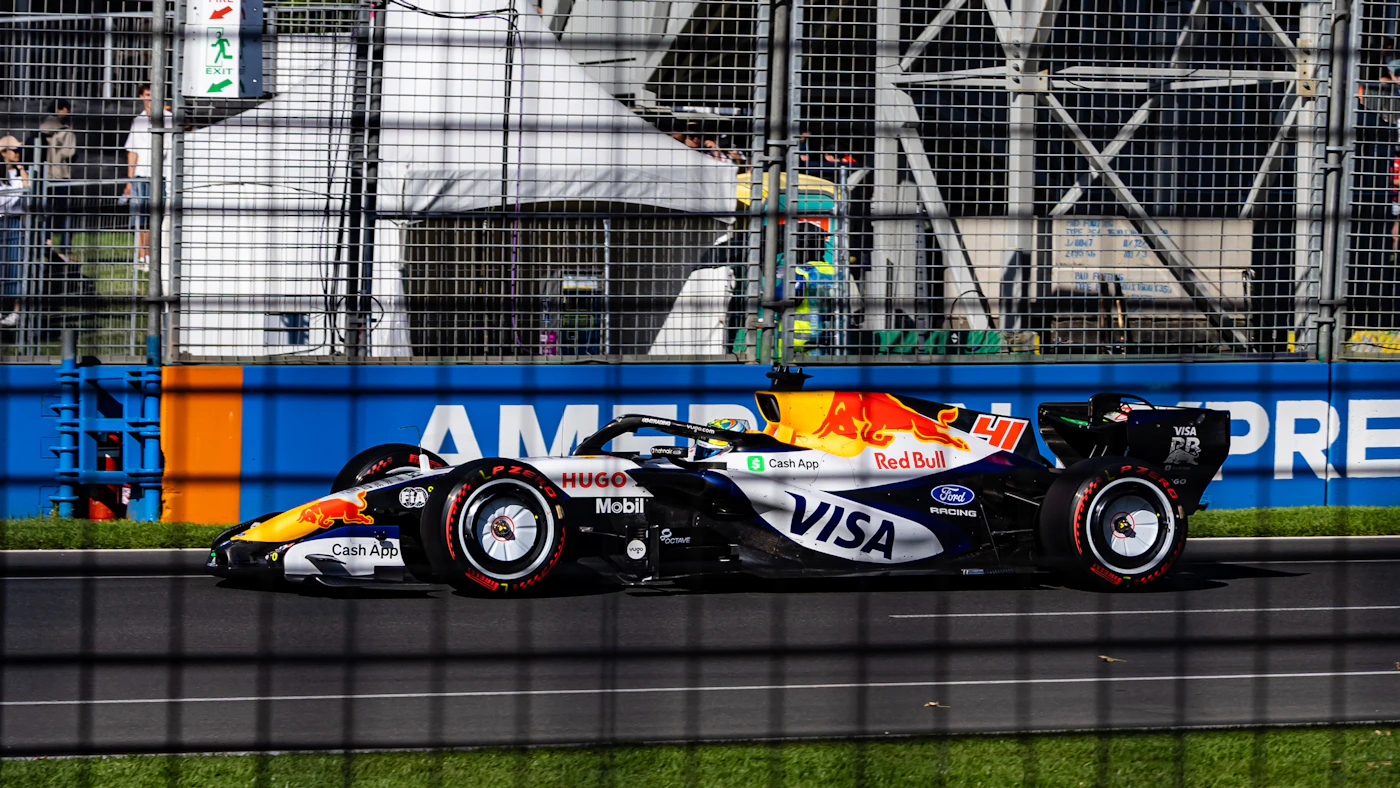 Formula racing car pushing through a corner on track