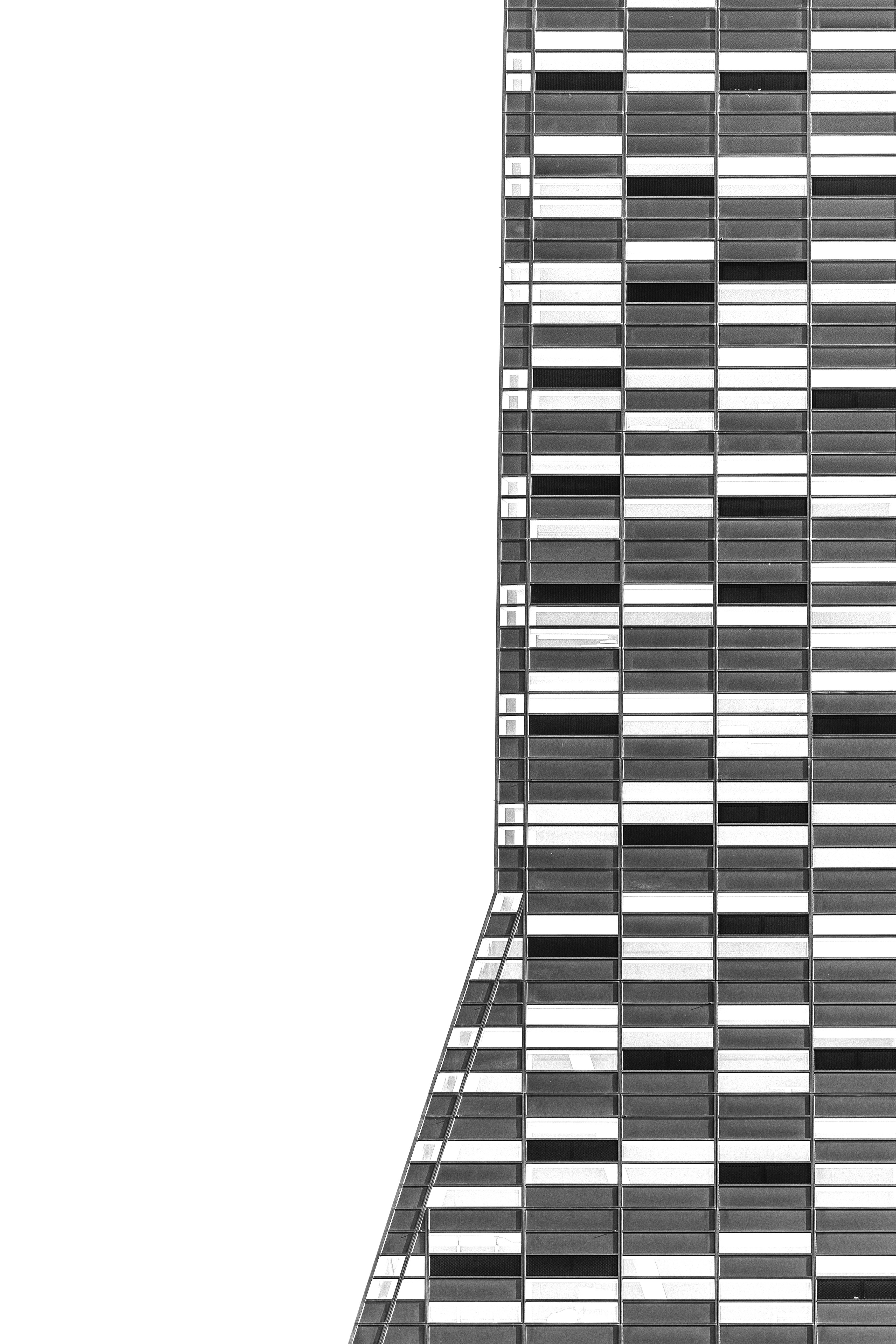 Modern building facade with repeating window pattern