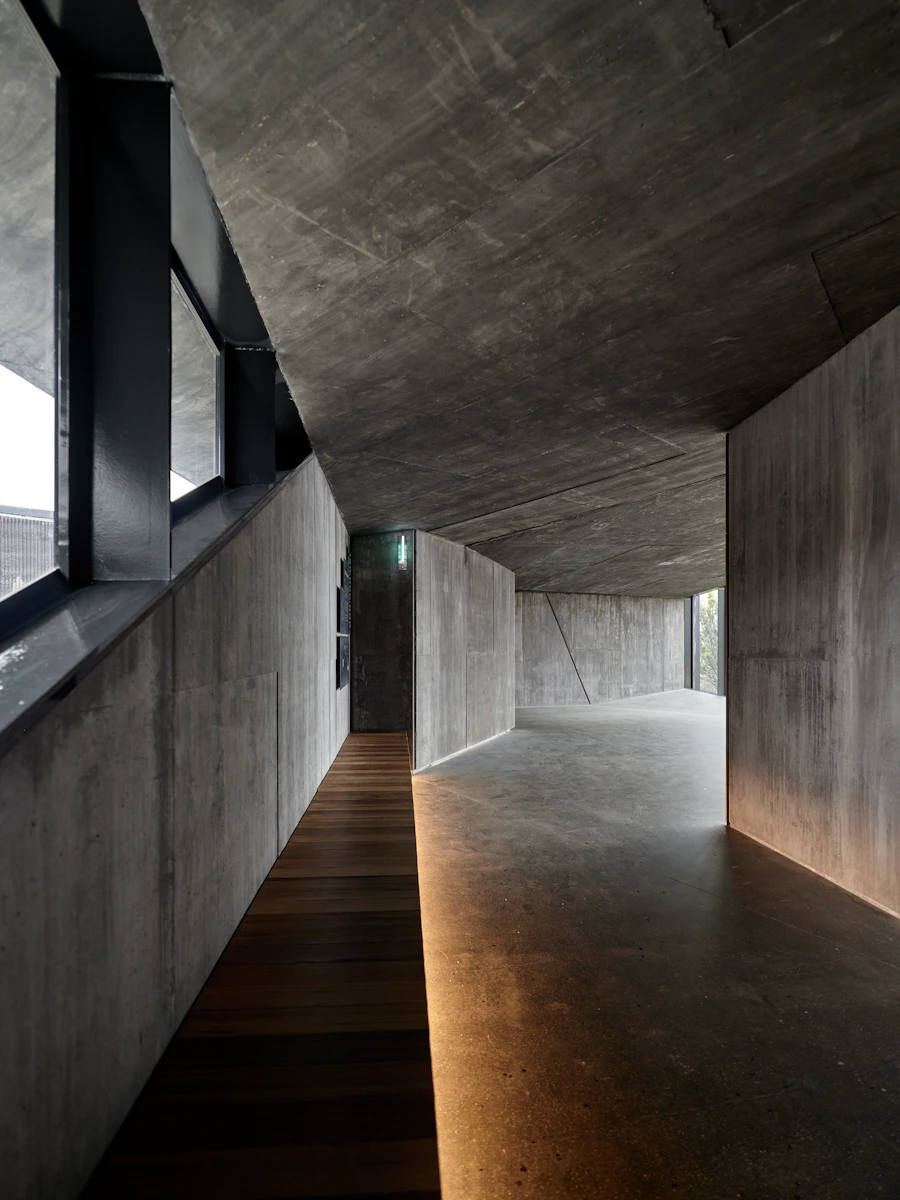 Modern concrete interior with dramatic light