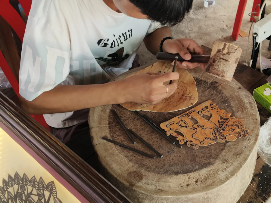 A craftsman carving wood with traditional tools