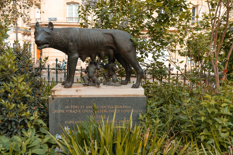 Bronze statue of a she-wolf nursing two infants