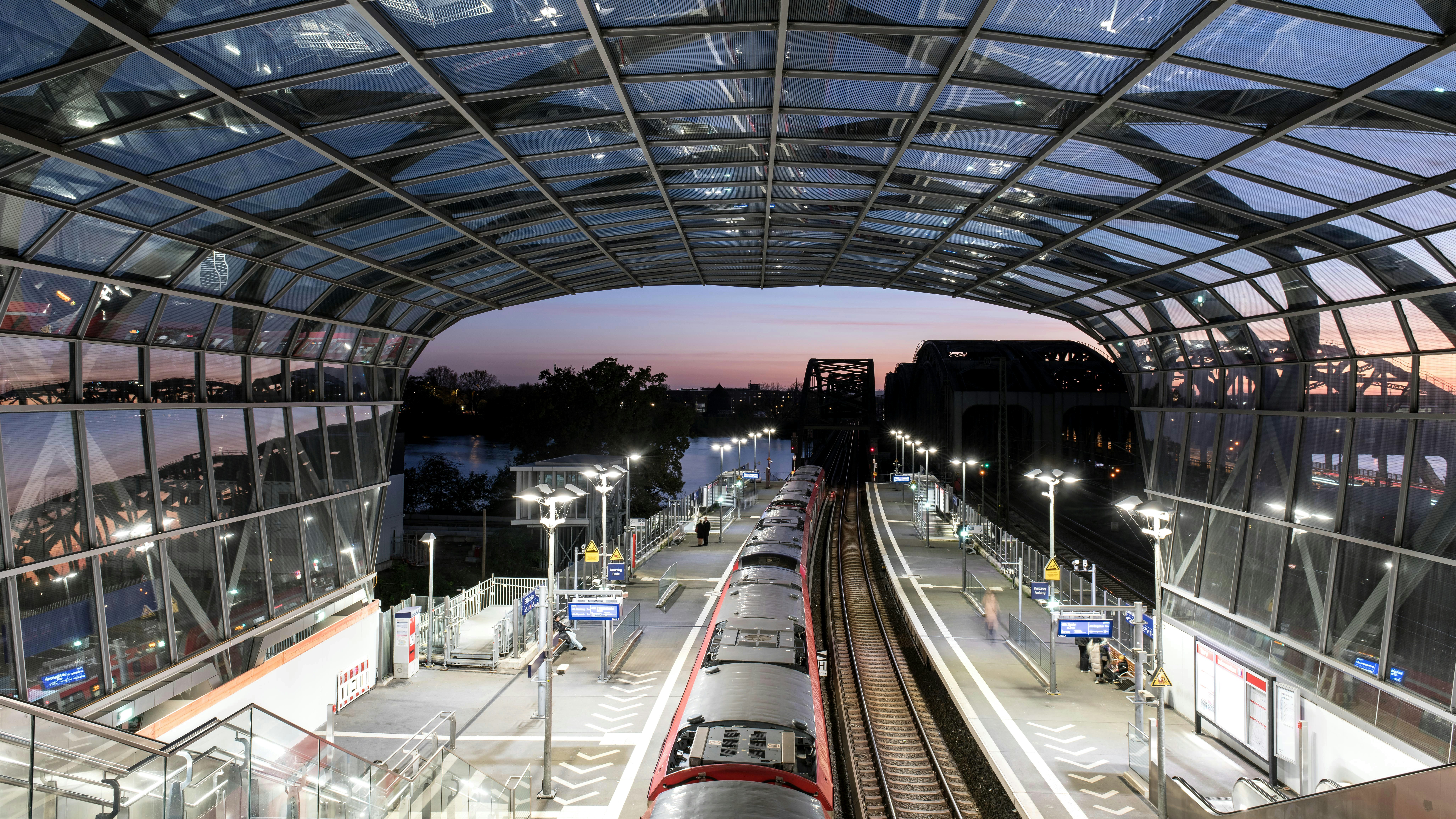 Modern train station with a glass roof
