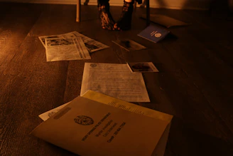 Papers and documents scattered on the floor.