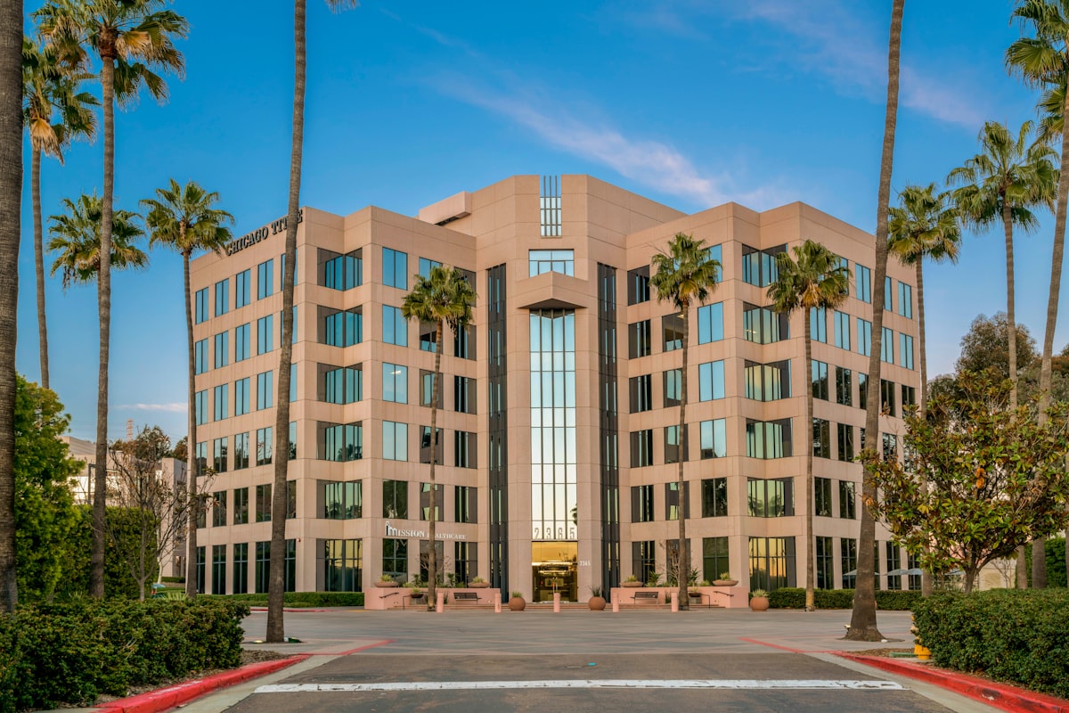 Mid-rise commercial office building exterior — the type of building where tenant improvements happen