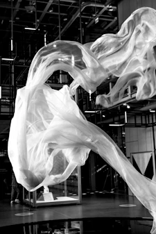 White fabric flowing in an indoor space