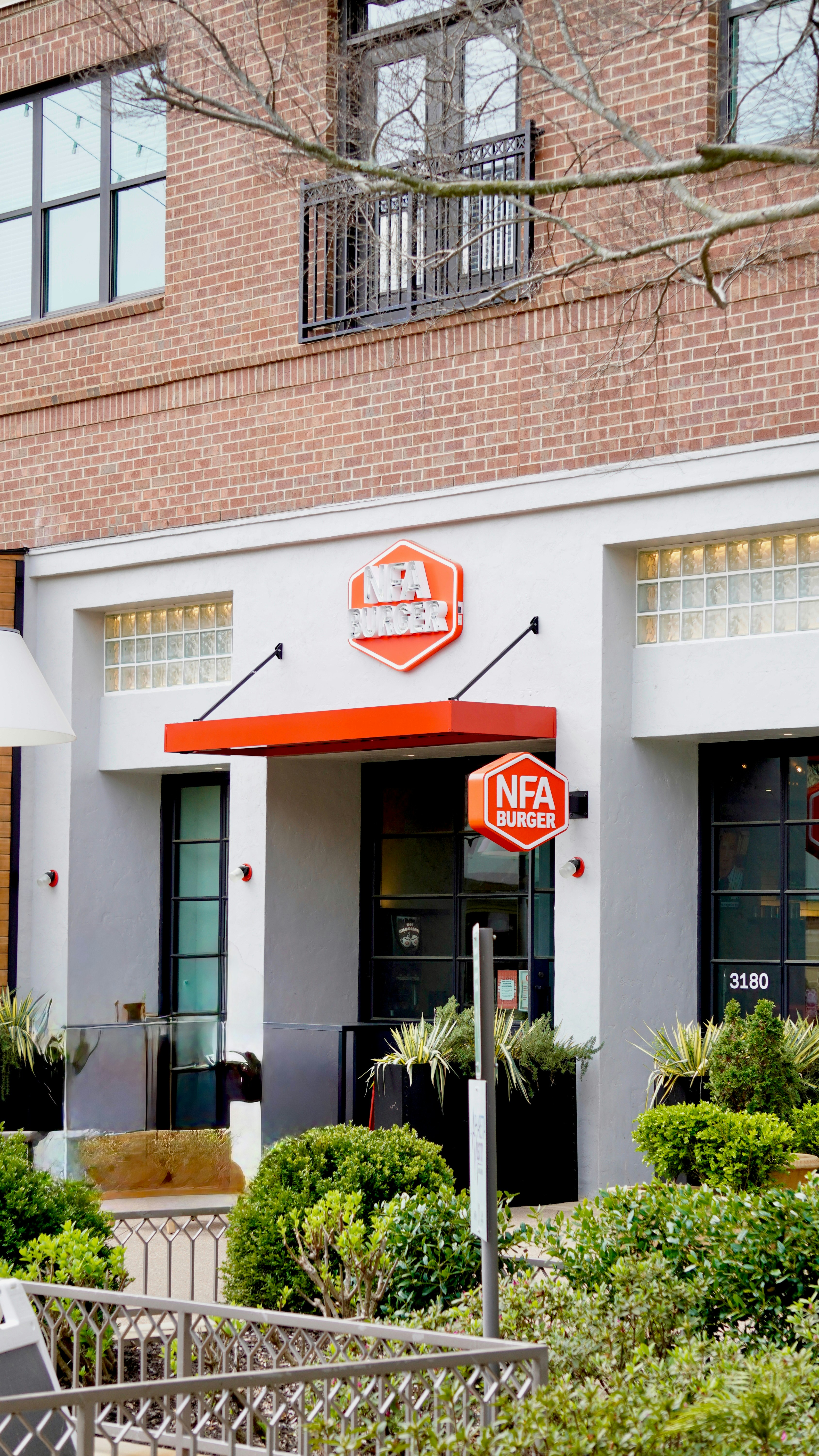 A modern building with an nfa burger sign.