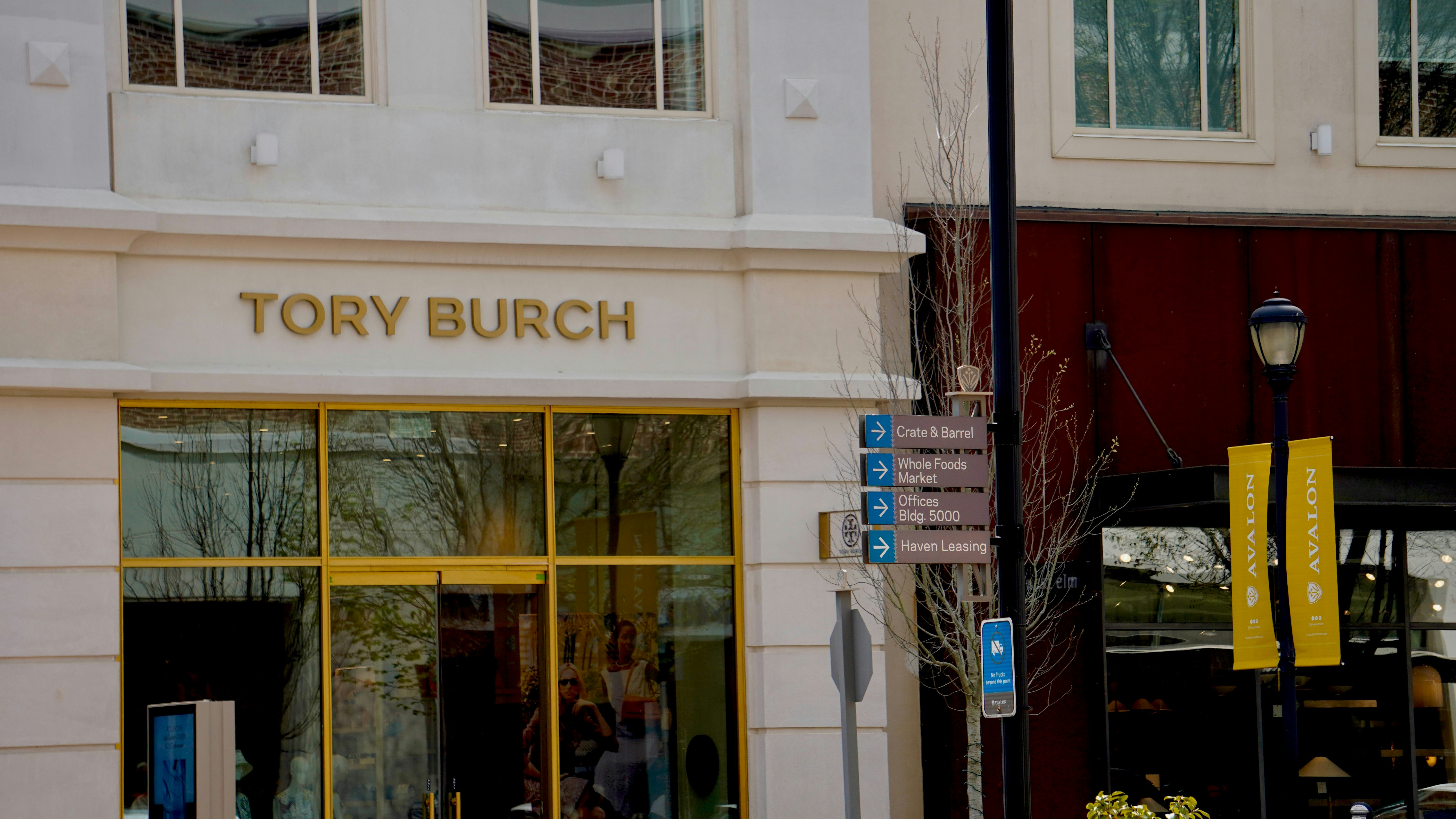 Tory burch storefront with large display windows