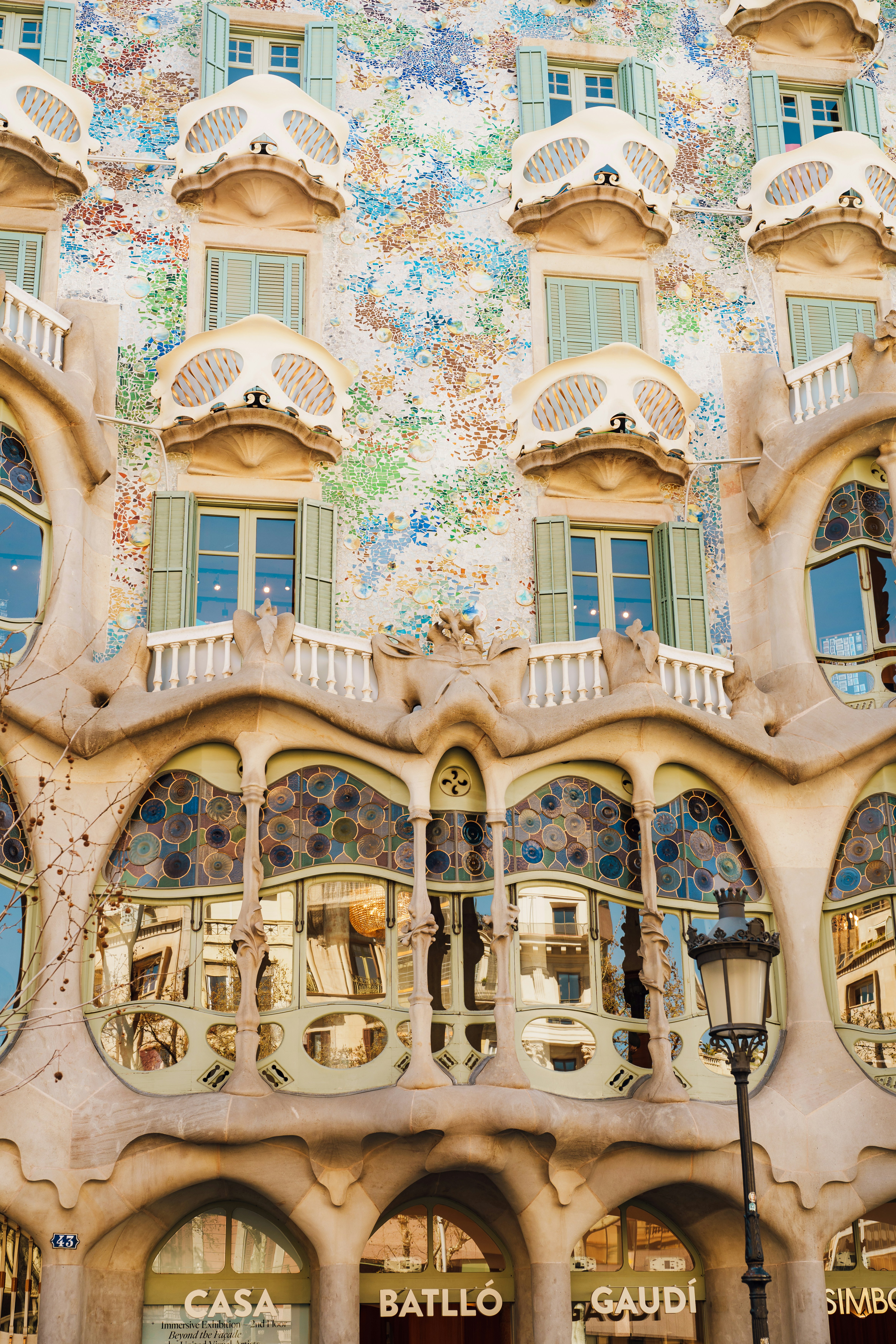 Ornate facade of casa batlló with unique windows and balconies