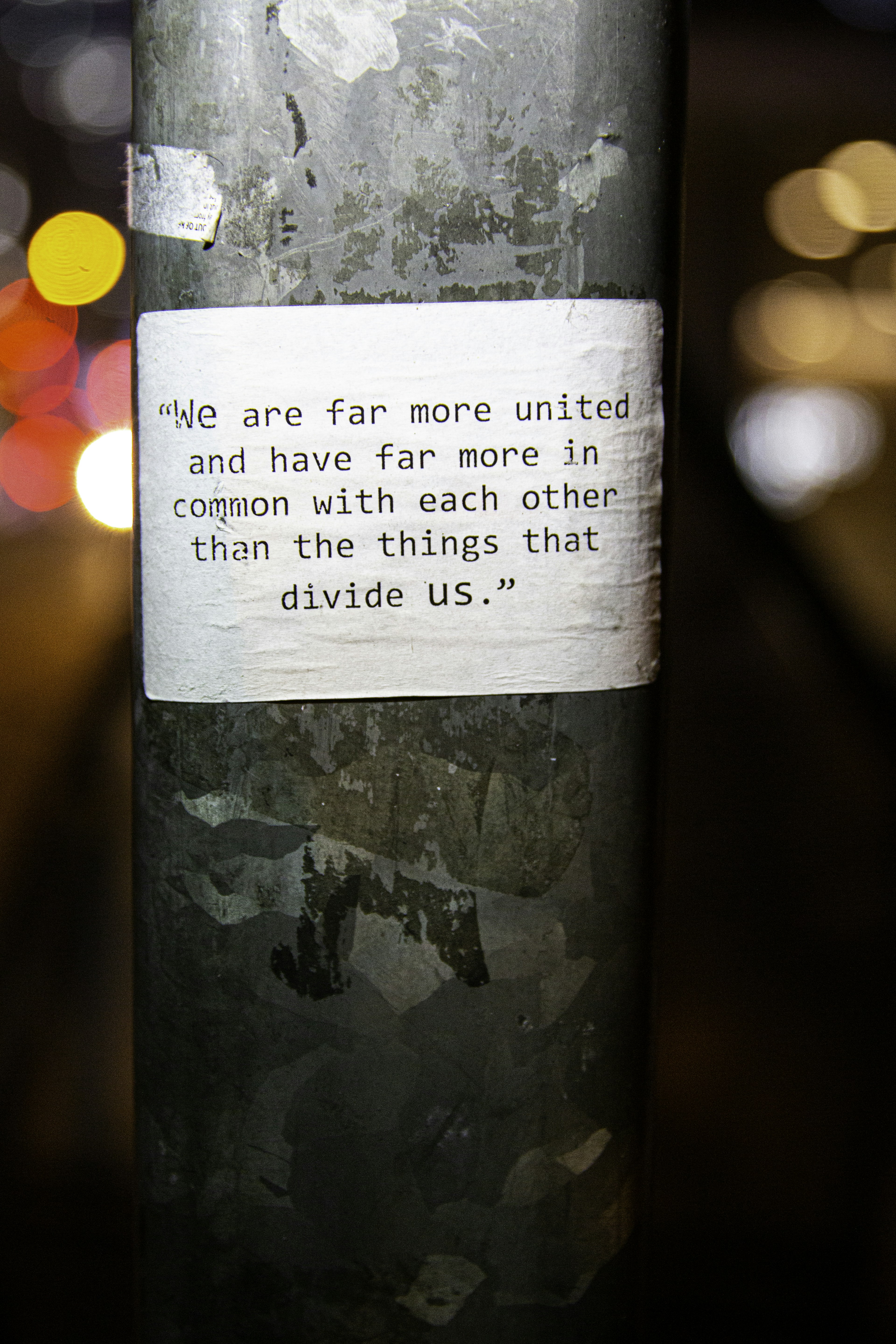 Quote on a pole about unity and commonality.