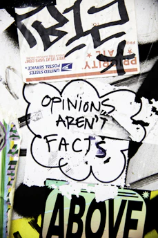 Cloud sticker with text "opinions aren't facts".