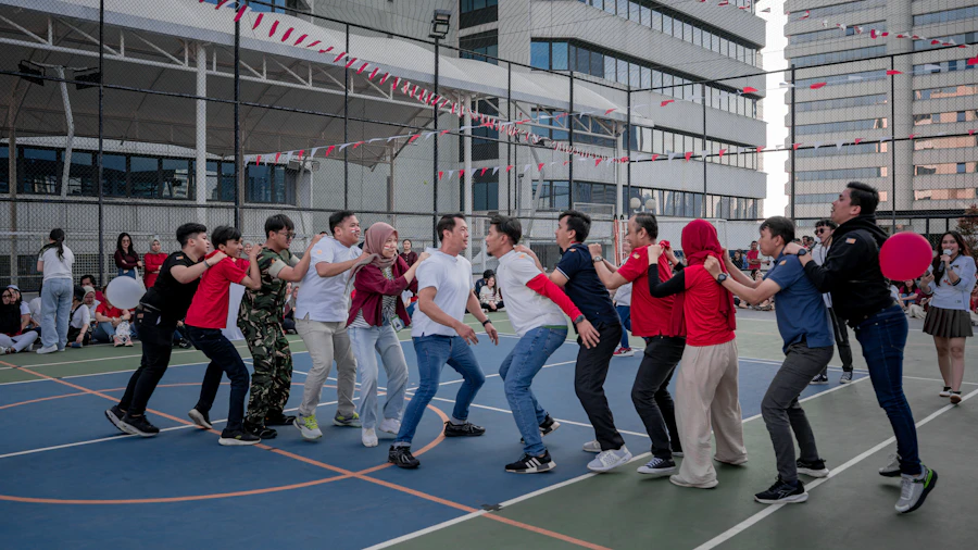 A group of people playing a tug-of-war game outdoors