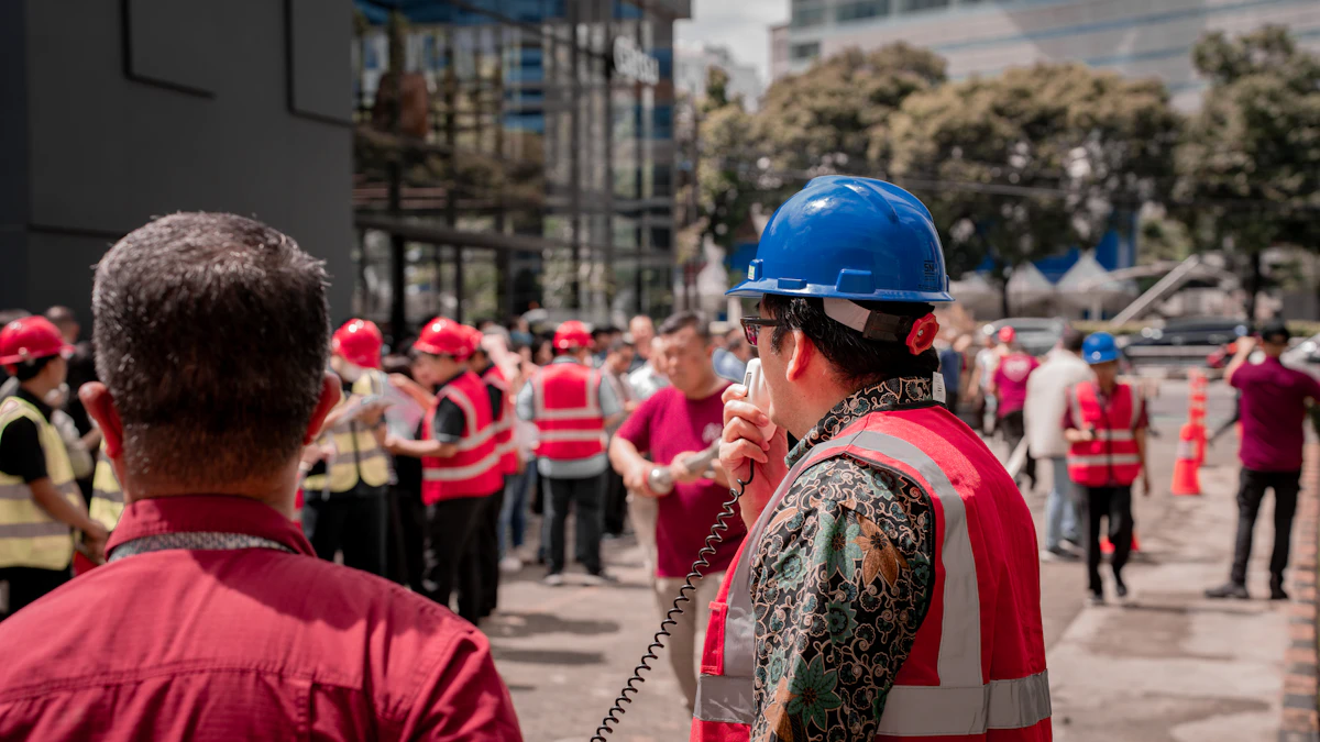 Foreman speaking into a radio to construction workers