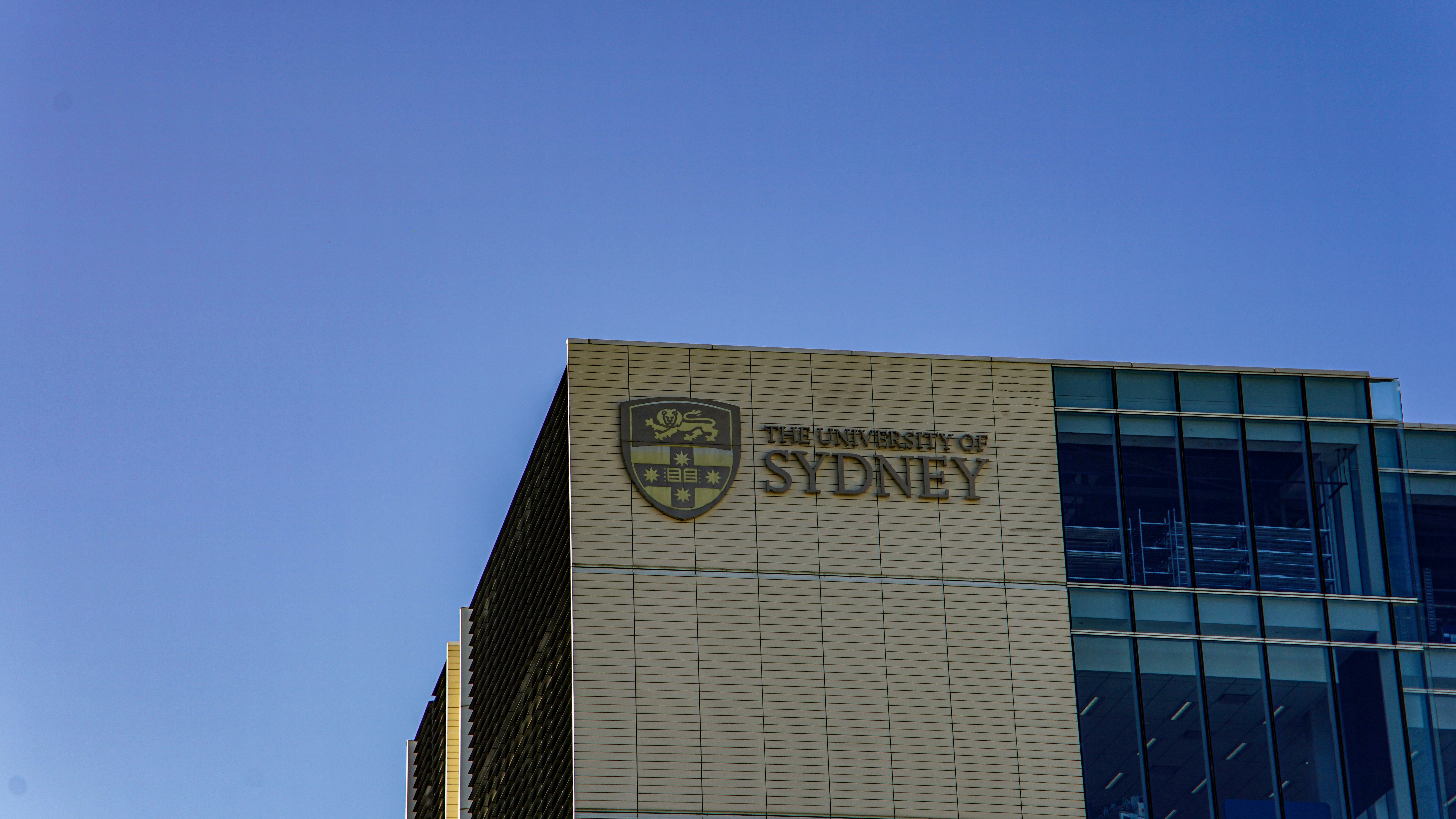 The university of sydney building against a clear blue sky