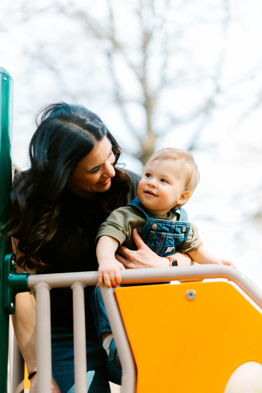Parent and child at a playground