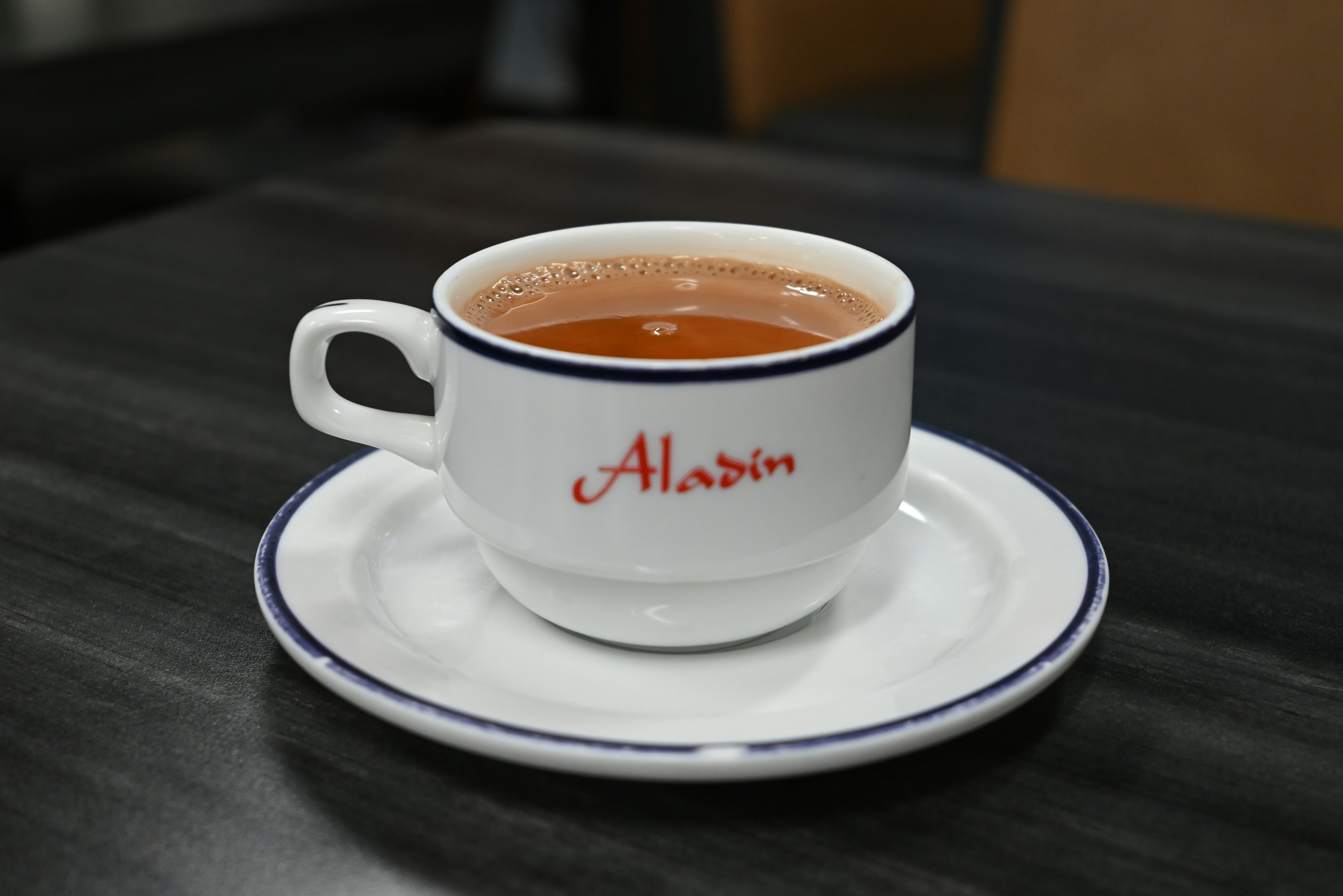 A cup of tea on a saucer