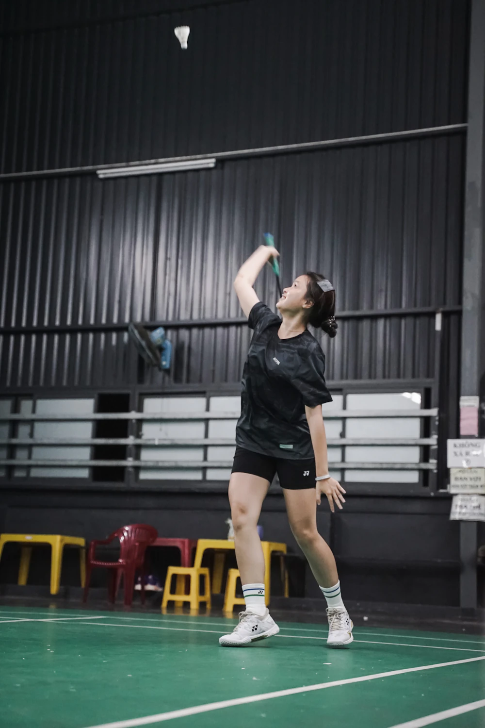 Young athlete practicing badminton