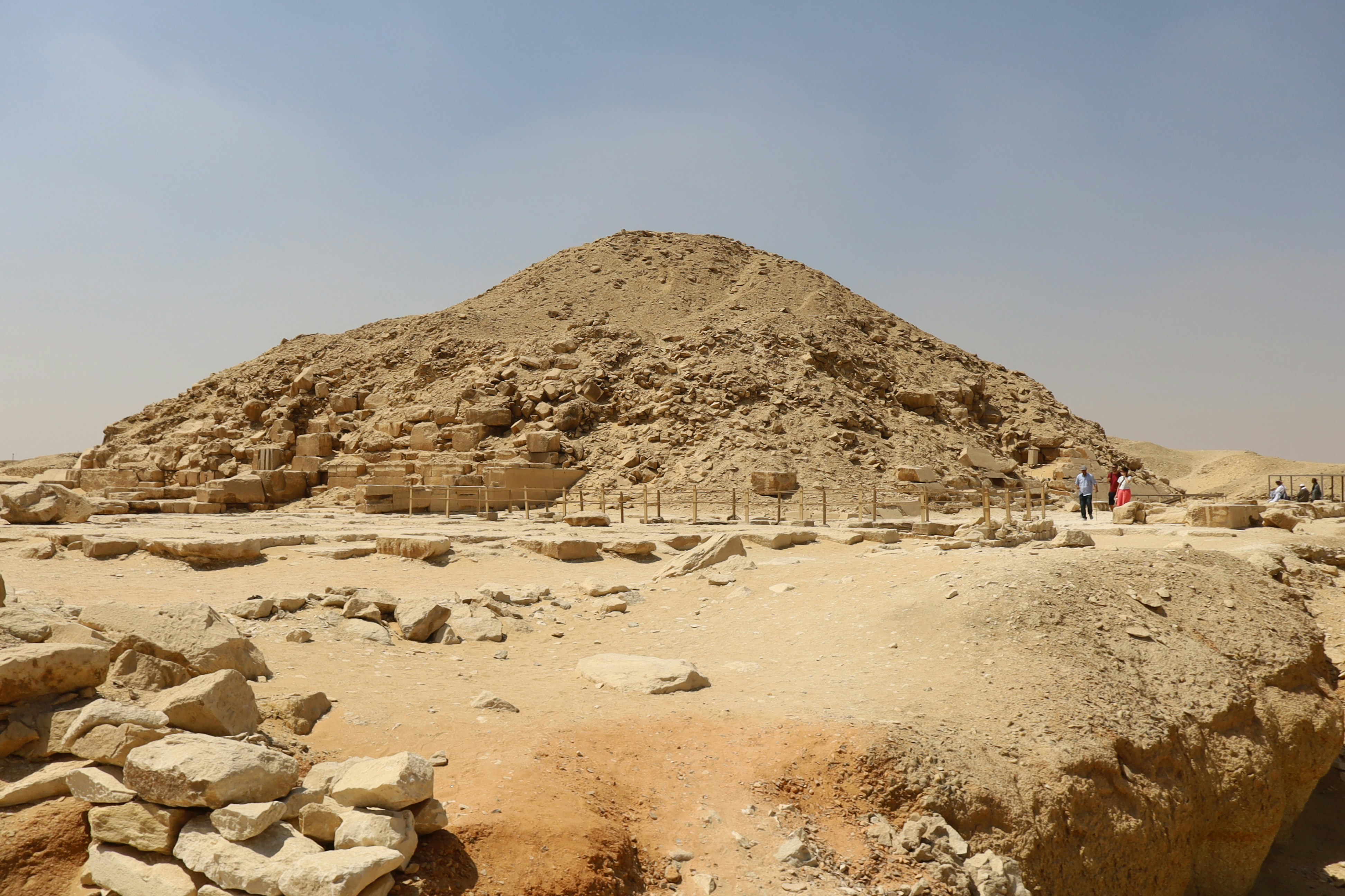 Ancient pyramid ruins in a desert landscape
