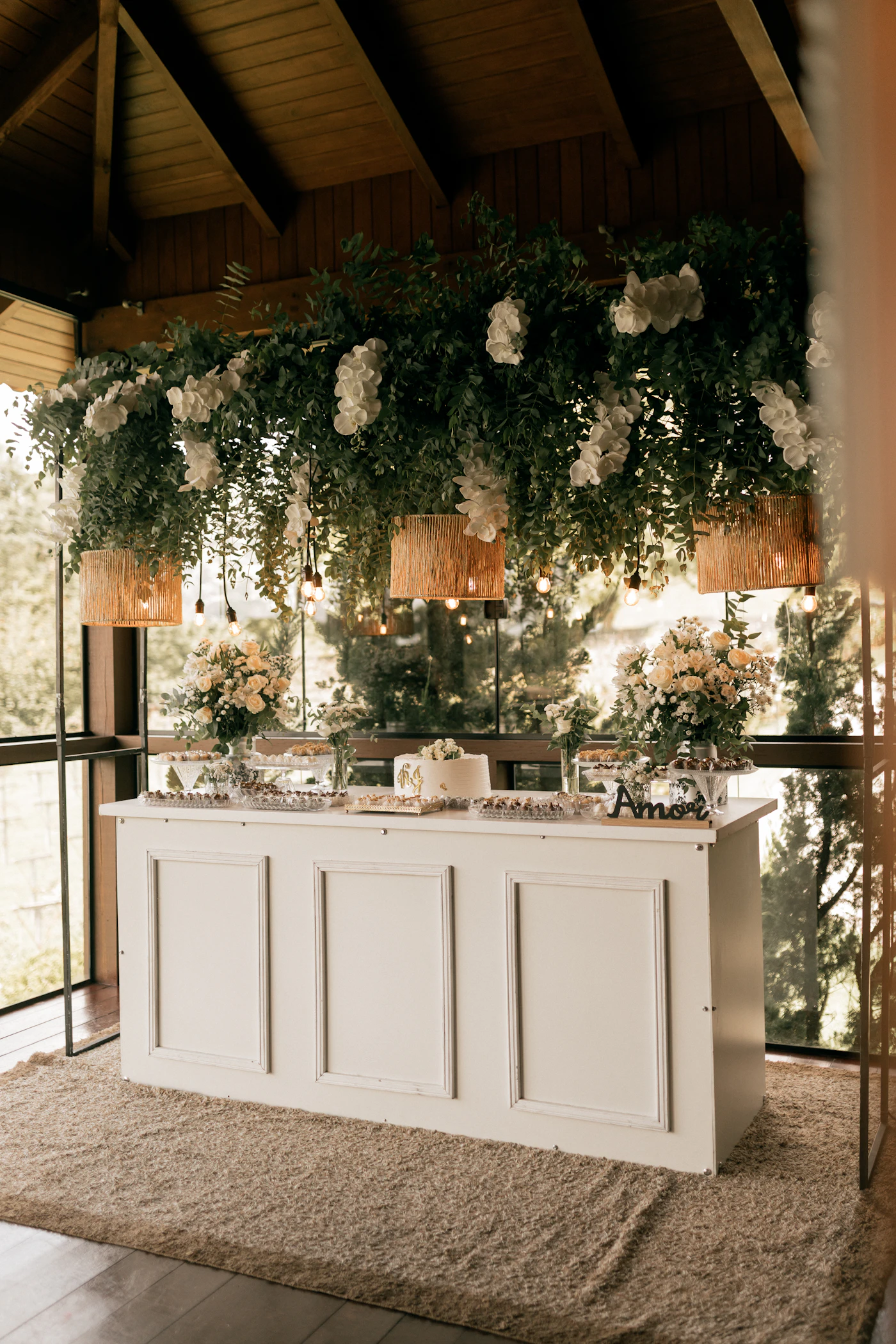 How to negotiate with venues for BYOB alcohol policies — A beautifully styled BYOB bar station at a rustic wedding reception.