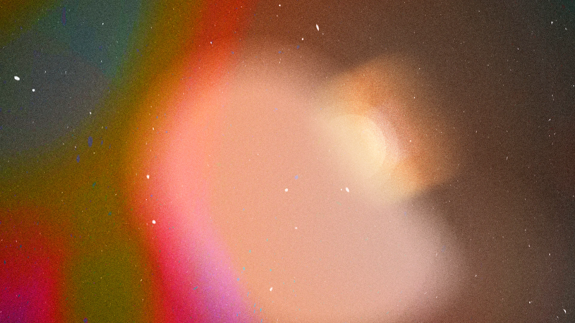 Abstract colorful light flares with small white dots