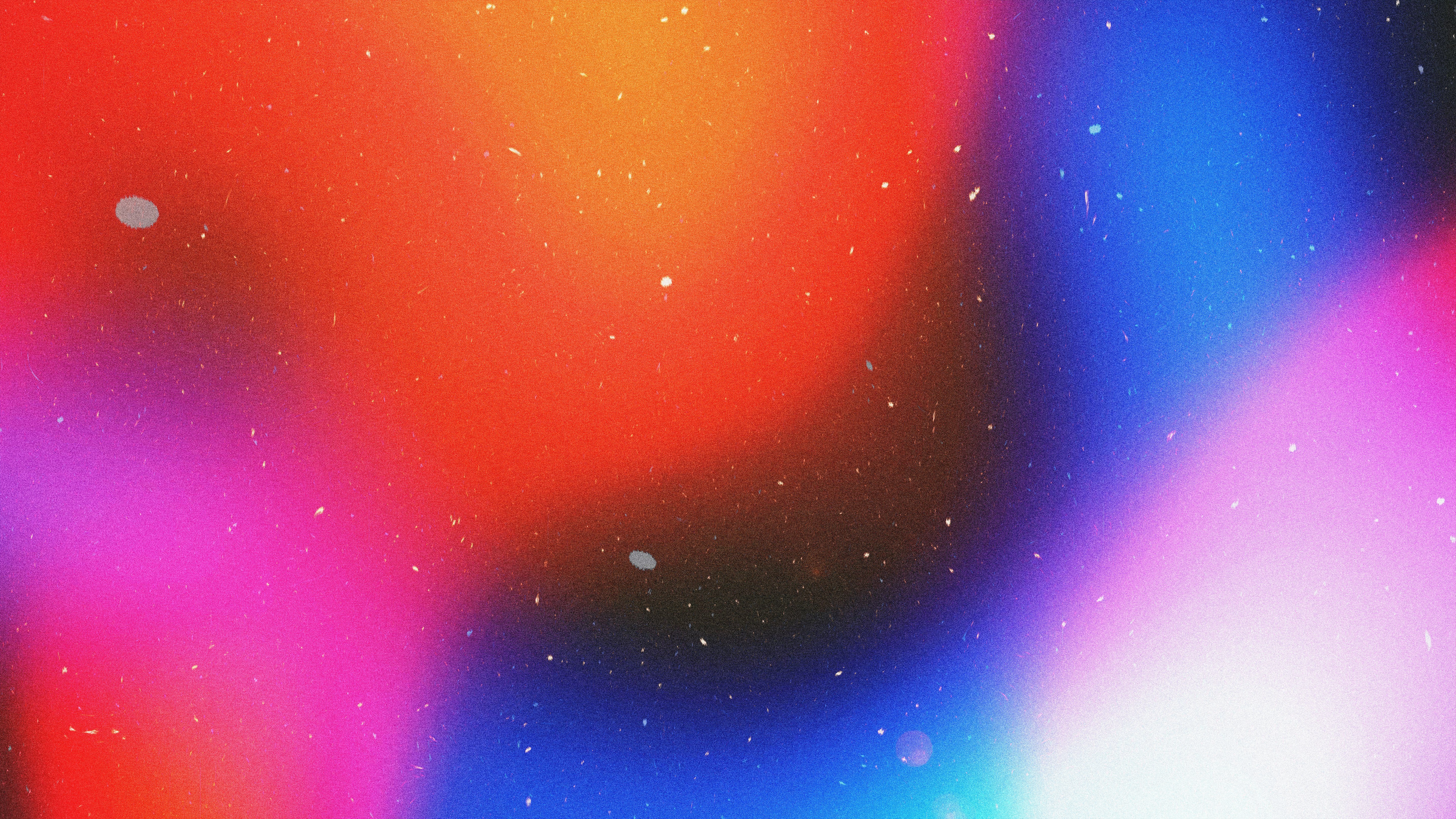 Abstract colorful bokeh lights with small white dots