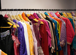 Colorful clothes hanging on a rack