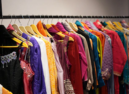 Colorful clothes hanging on a rack