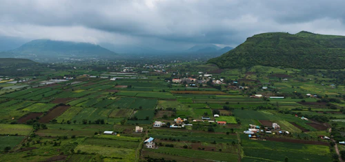Agricultural land beneath the mountains