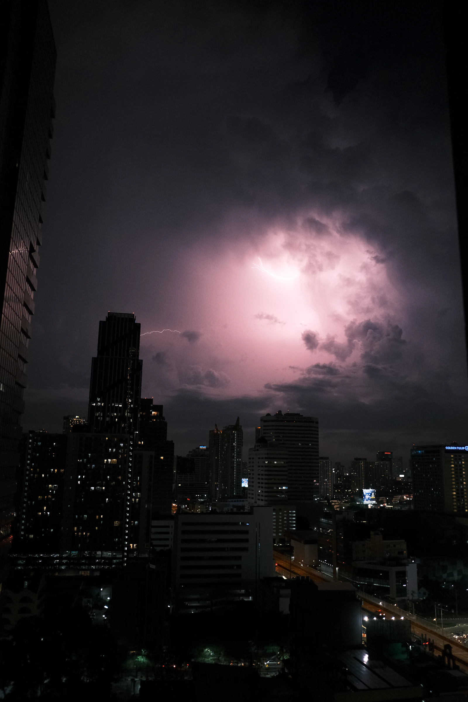 Lightning over the Bangkok skyline during stormy weather