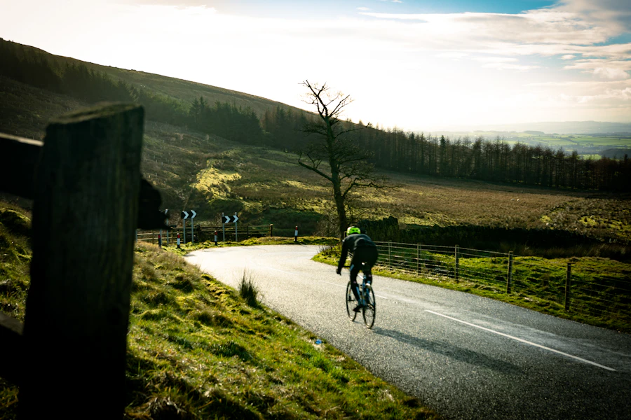 Cyclist on a winding country road