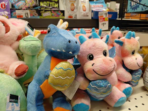 Plush dinosaur and dragon toys with easter eggs