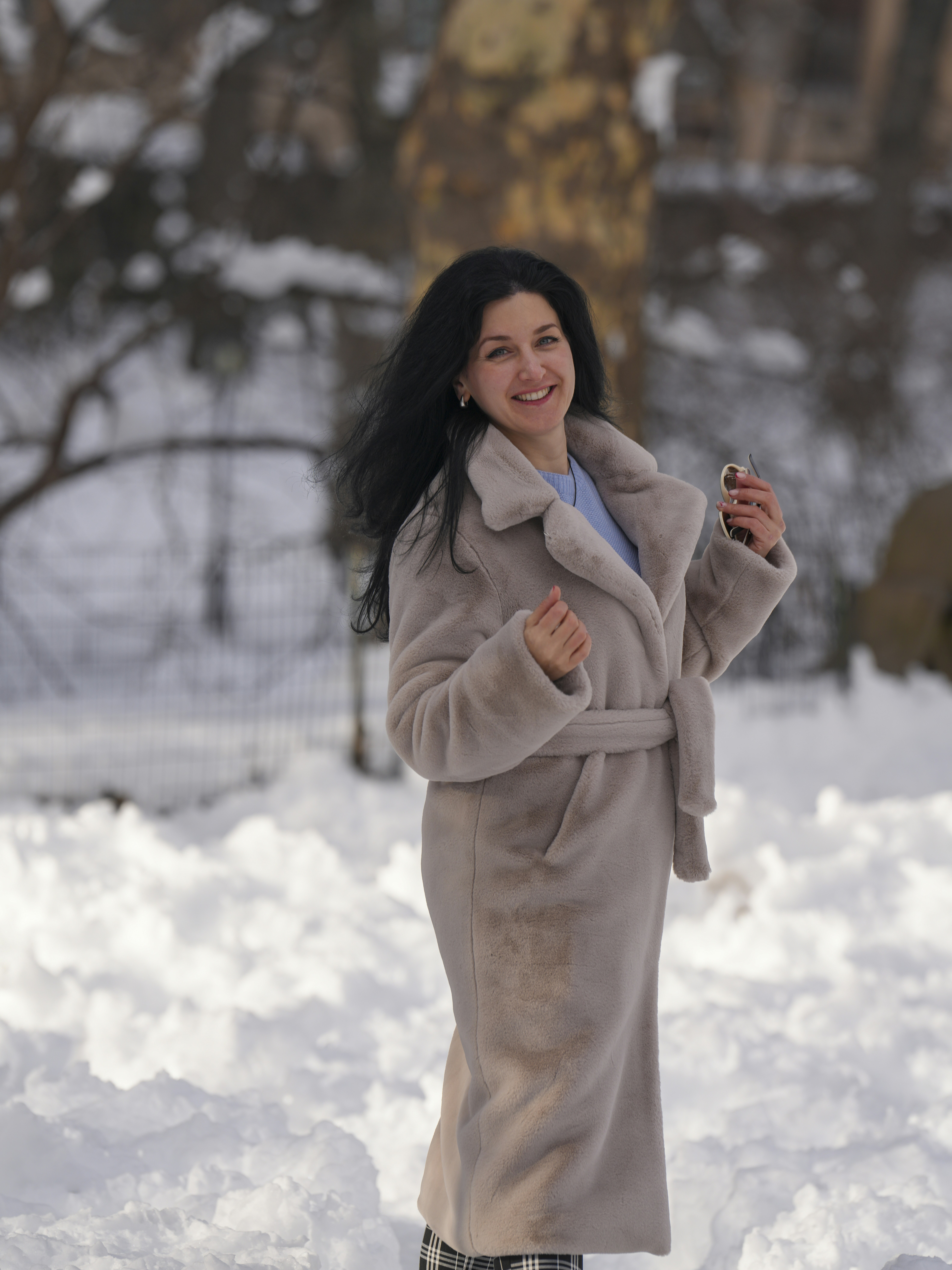 Cream teddy coat in fresh snow