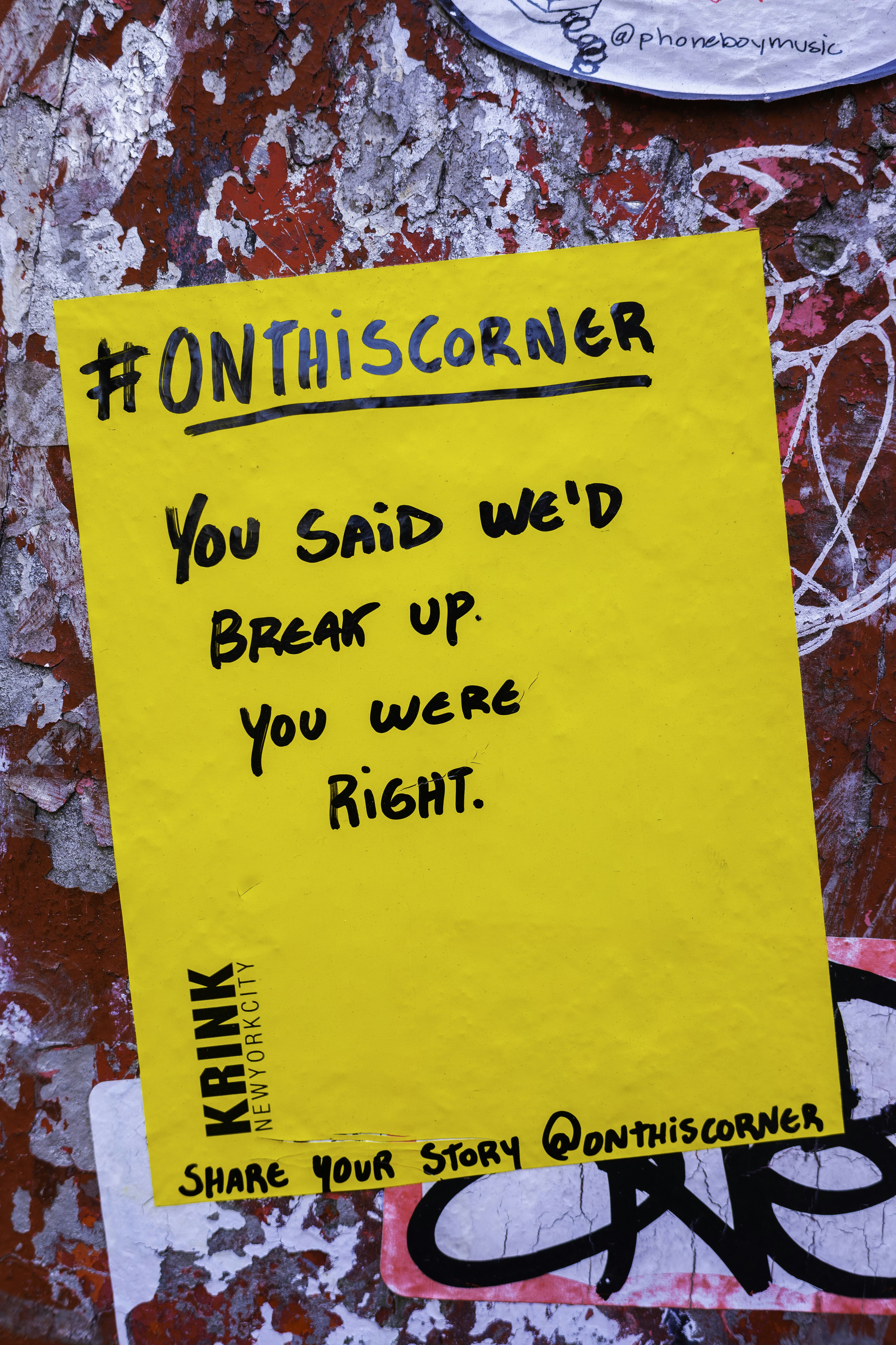 Yellow sticky note with text about a breakup.